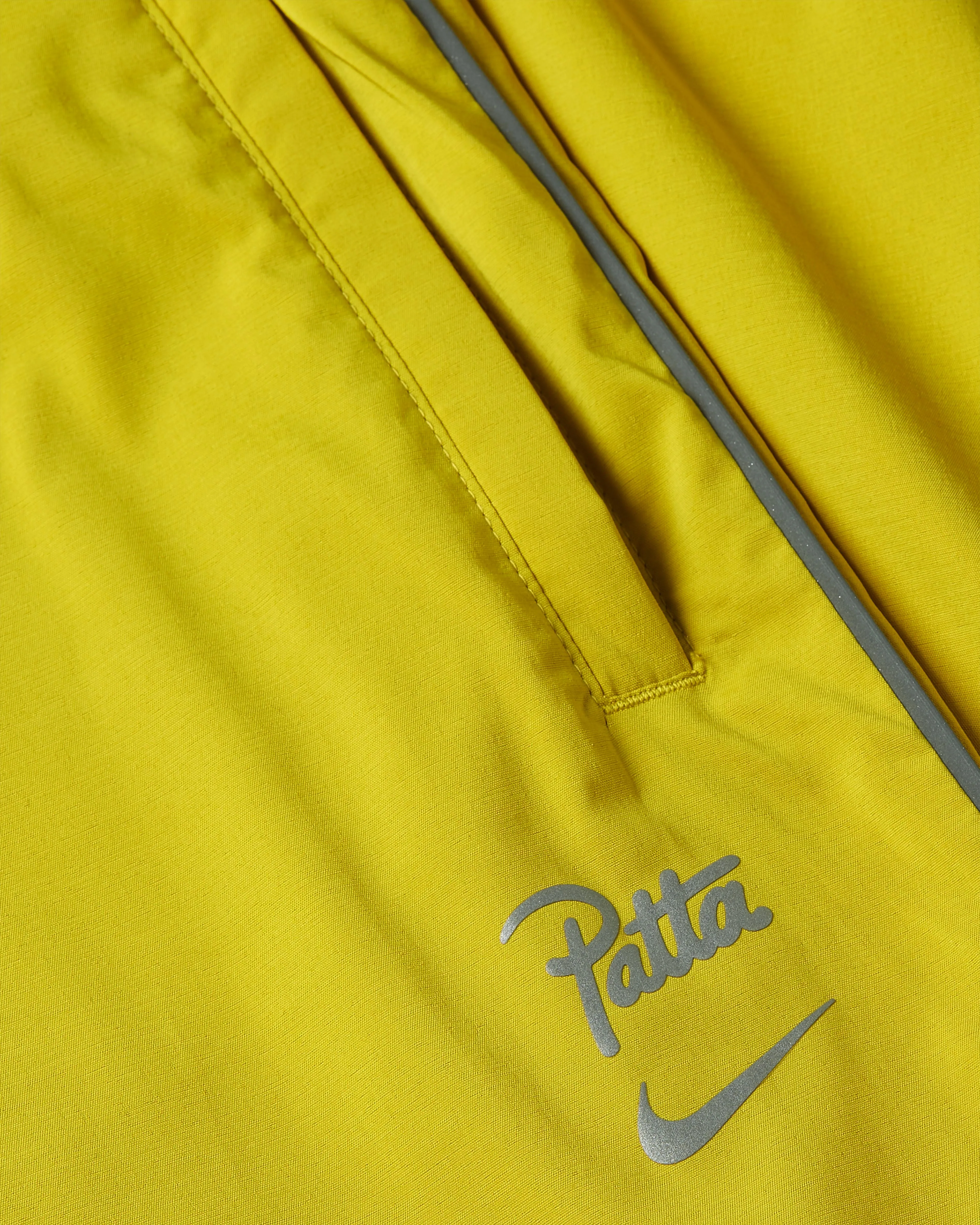 Nike x Patta Running Team Track Pants (Saffron Quartz)